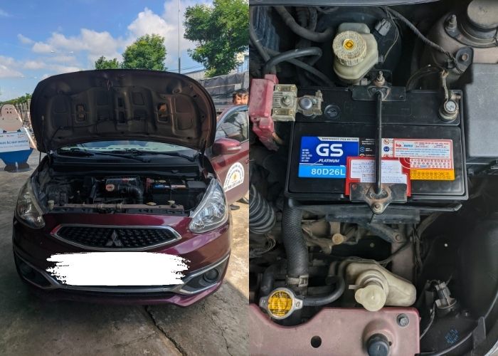 Hình ảnh nhân viên Ắc Quy Hòa Phát lắp đặt ắc quy xe Mitsubishi Mirage